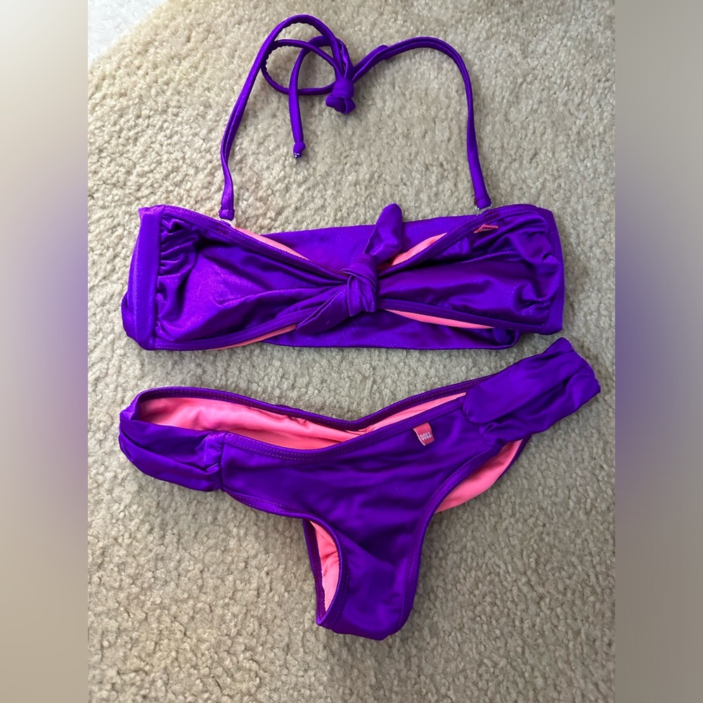 NWOT Doll Purple Bikini Set with Pink Lining. Women’s Size Small. Never Worn.